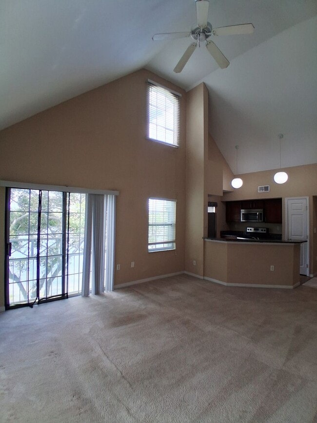 Building Photo - Water view condo with garage in sought after westchase