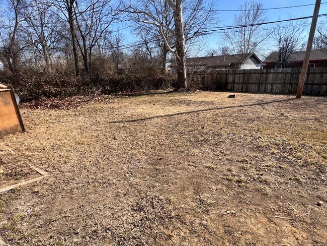 Building Photo - Charming 3-bedroom, 1-bath home featuring an attached carport and a fully fenced backyard—perfect...