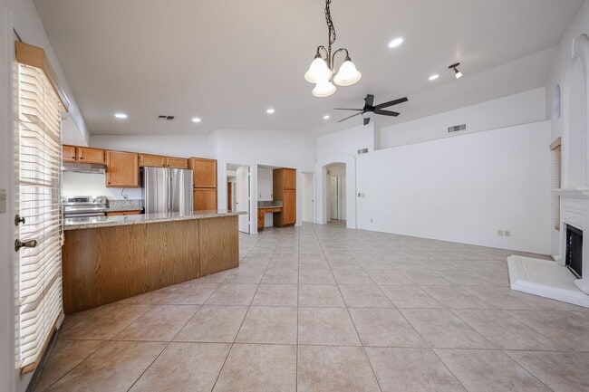 Building Photo - Welcome to this stunning 4-bedroom, 2-bath...