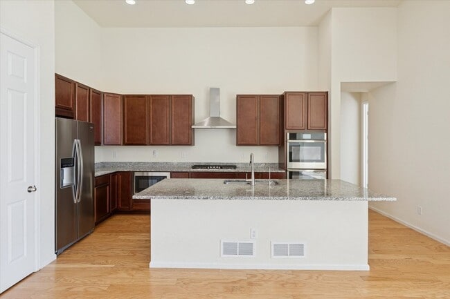 Building Photo - Modern 4-Bed Ranch in Erie with 13-Ft Ceilings, Solar Panels & EV Charger