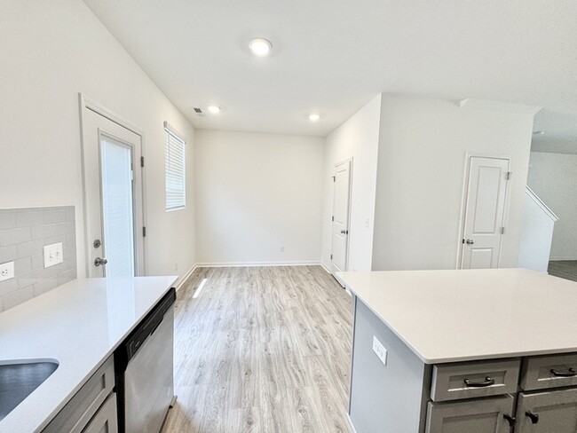 Building Photo - Three bedroom 2 1/2 at townhome close to s...