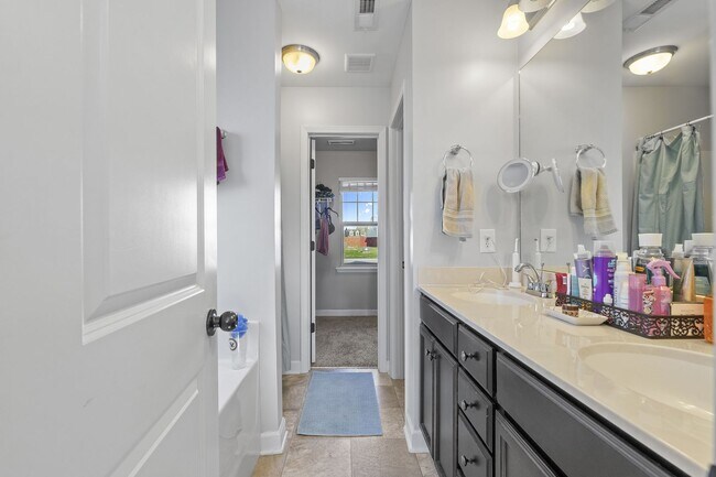 Building Photo - 3 Bedroom + Bonus Room Home with Main Floor Primary Suite & Community Pool Access