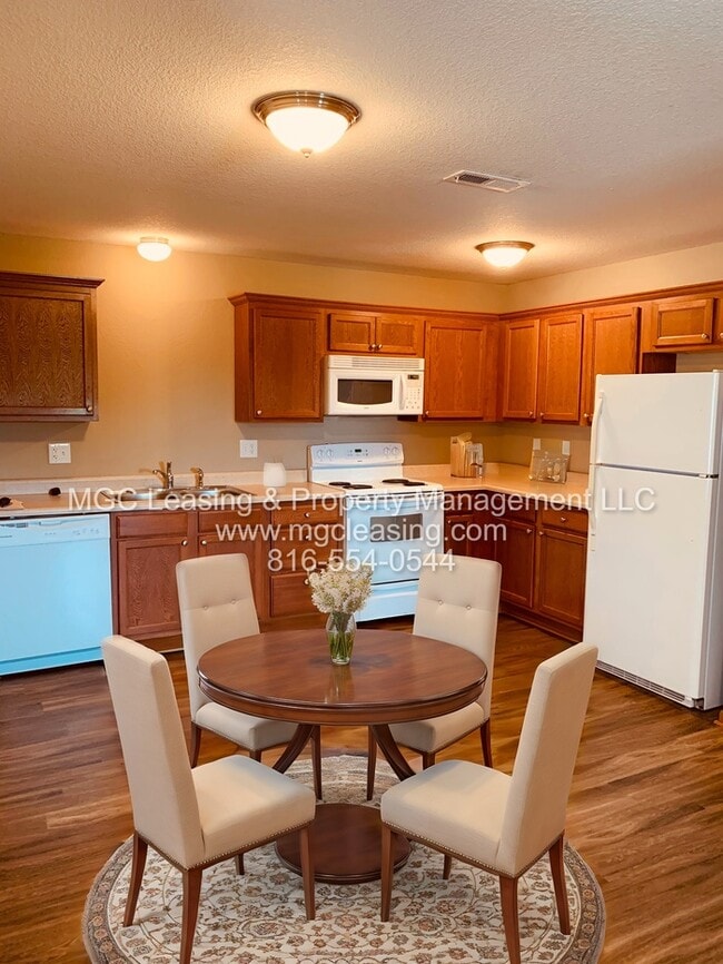 Building Photo - Charming Brick Ranch Duplex in the Heart of Lone Jack - Ready Now