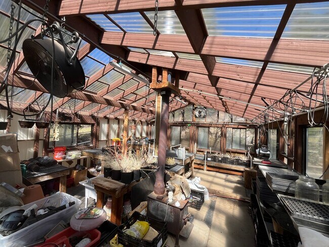 Building Photo - Custom Rustic 4-Bdr on beautiful 5 acres with Greenhouse in Sisters!