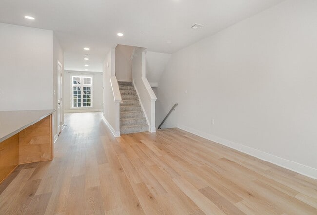 Building Photo - Modern 2025 Townhome | Open-Concept Living, Chef’s Kitchen with Large Island & 2-Car Garage
