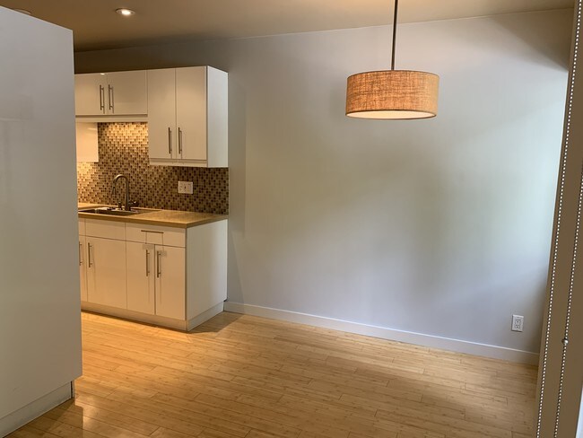 Dining Area into Kitchen - 1250 N Kings Rd