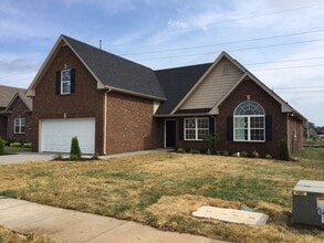 Building Photo - Executive Living!
