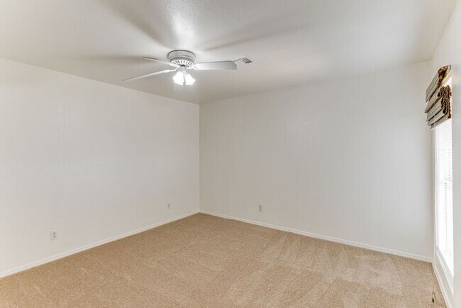 Building Photo - Charming 2 Bed, 2 Bath Condo with Fireplace & Balcony! 89011