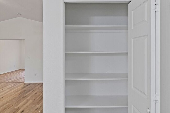 Building Photo - Wonderful 3 Bedroom Home with New Flooring and Paint