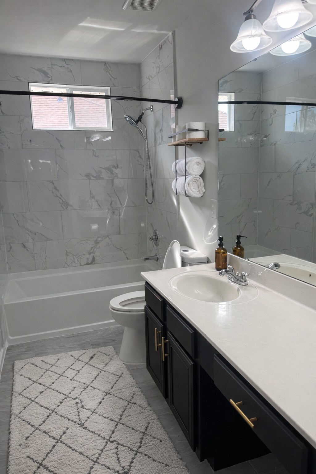 Bathroom 2 - also updated with porcelain showers and floors - 429 Indigo Ridge Dr