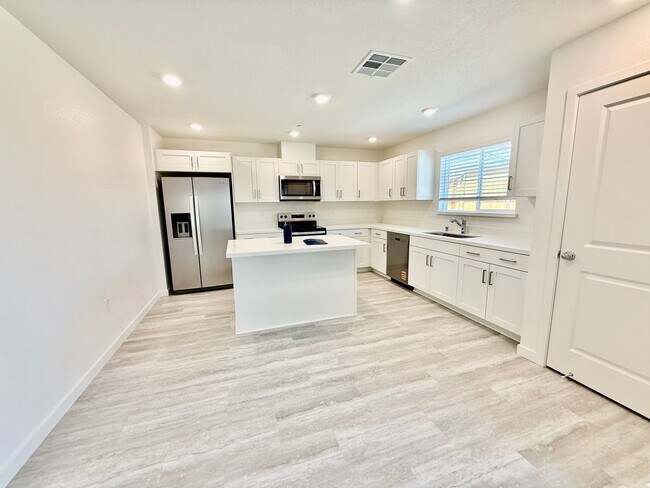 Building Photo - New home available now