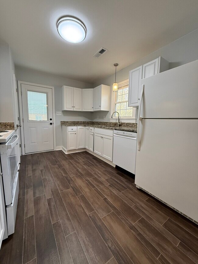 Building Photo - BIG House & BIG Fenced Yard. Plus Master Suite, Den, Shed, and More!