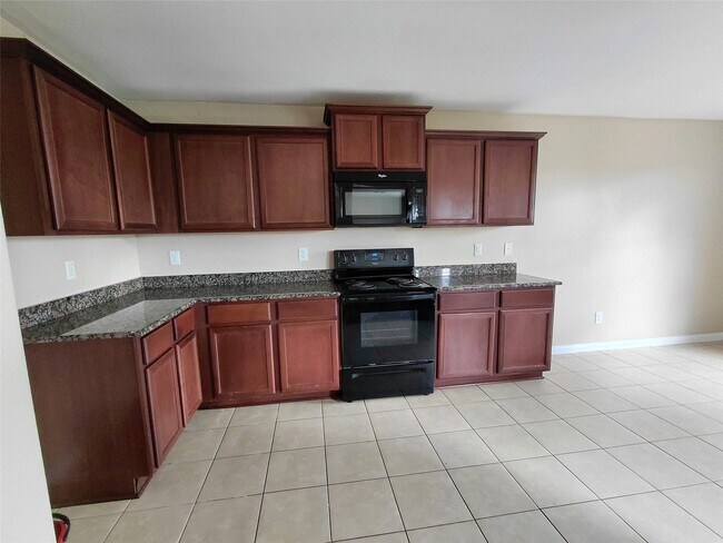 Building Photo - 8902 Stagewood Dr