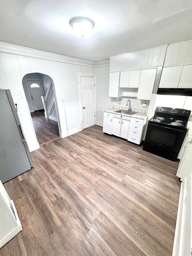 Building Photo - THREE Bedroom/ONE Bath Row Home