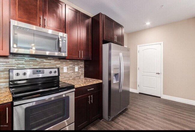 Kitchen appliance with Pantry door in view - Huge U-shaped pantry(not shown) - 2821 S Skyline
