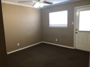 Building Photo - 3/1.5 House with HUGE backyard available in February!