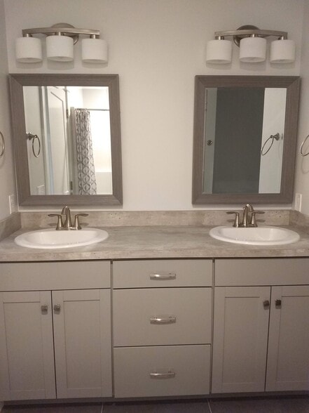 Double vanity in both full bathrooms - 712 N 12th St
