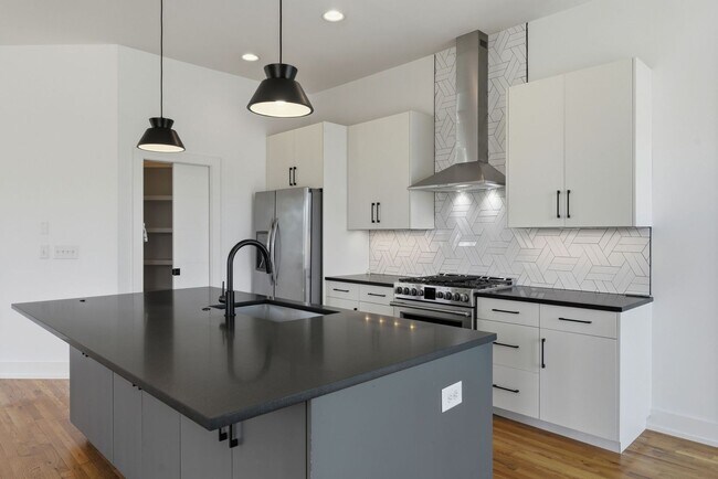 Building Photo - Beautiful 3-BR Property with Rooftop Deck!