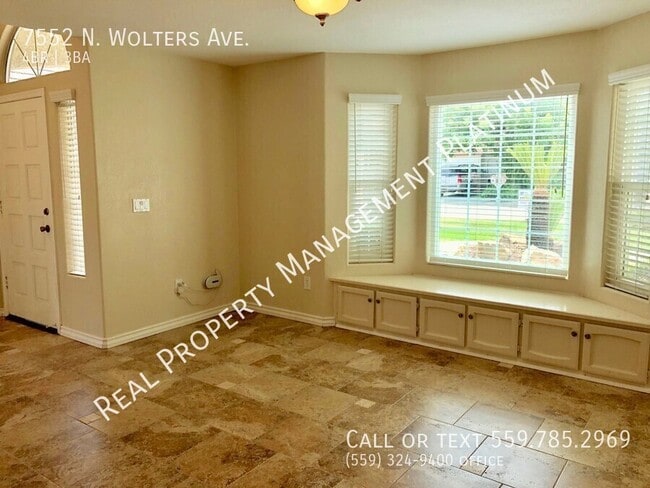 Building Photo - 7552 N Wolters Ave