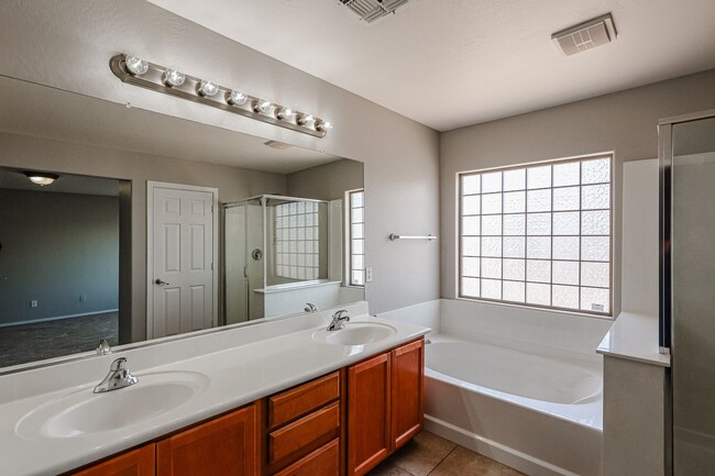 Building Photo - Welcome to this spacious 4 bedroom, 2.5 ba...