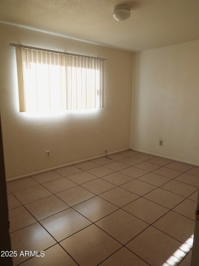 Building Photo - 6713 W Palmaire Ave