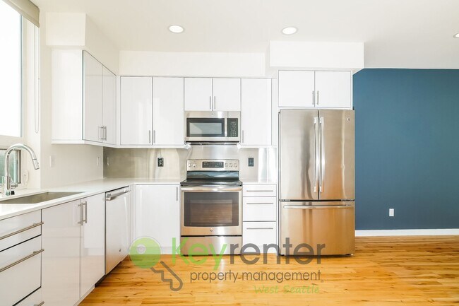 Building Photo - **Rent Special** Modern Two Bedroom Townhome with Designated Parking