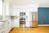 Building Photo - **Rent Special** Modern Two Bedroom Townhome with Designated Parking