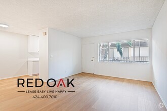 Building Photo - Charming One Bedroom with Sunlit Open Floo...