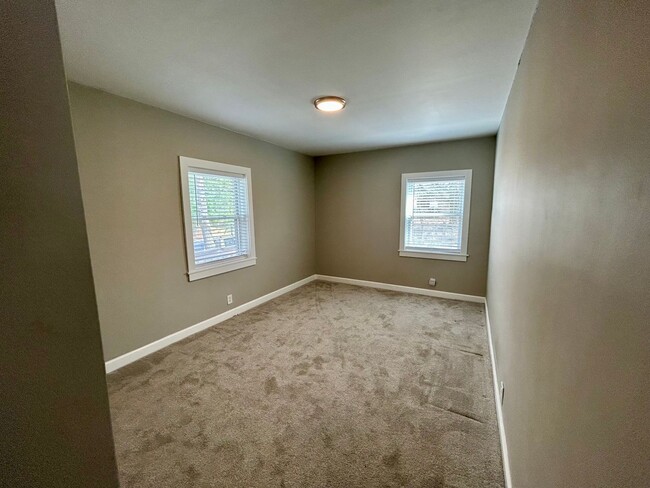 Building Photo - DELHI TWP- Spacious 4 bedroom 3 bath Cape Cod with garage