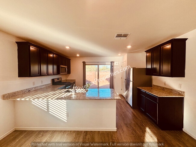 Building Photo - 12867 N Peony Dr