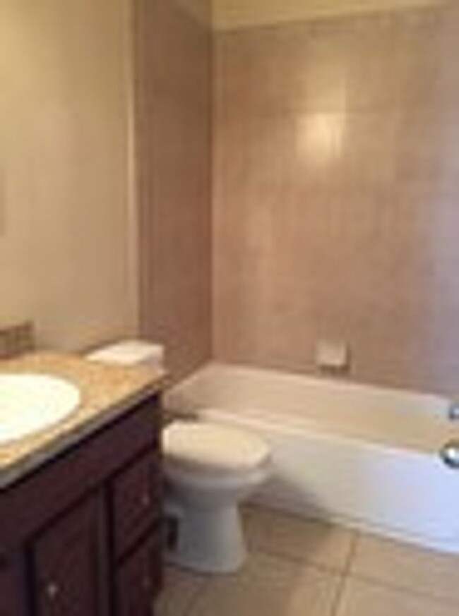 Building Photo - HIDDEN CREEK CONDO