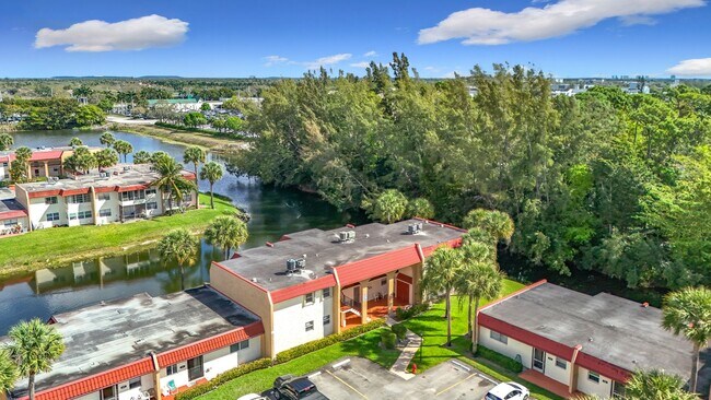 Building Photo - Desirable 55 plus community condo unit with a view of the lake on the 2nd Floor.