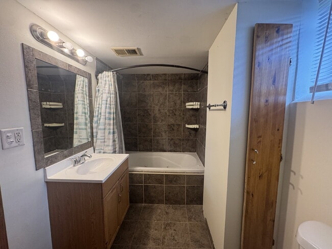 Building Photo - "Charming 3-Bed Haven with Hardwood Floors & Cozy Fireplace in St. Louis Park!"