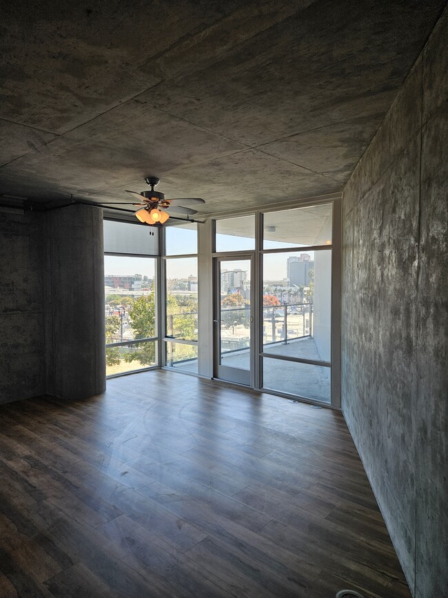 Living room and balcony - 1080 Park Blvd