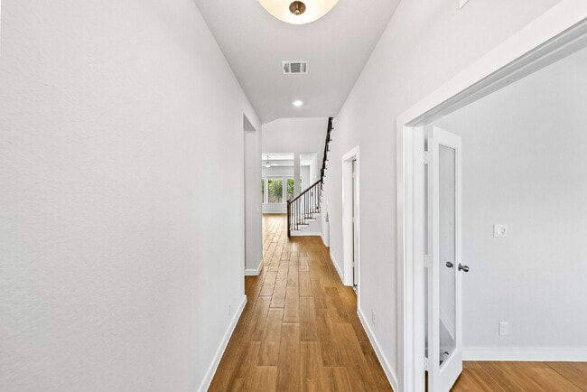 Building Photo - Greenbelt. 3 Car Garage. Built In Dog Room.