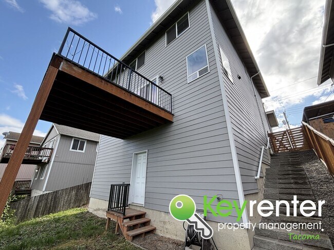 Building Photo - Stylish 4-Bedroom Home with Finished Basem...