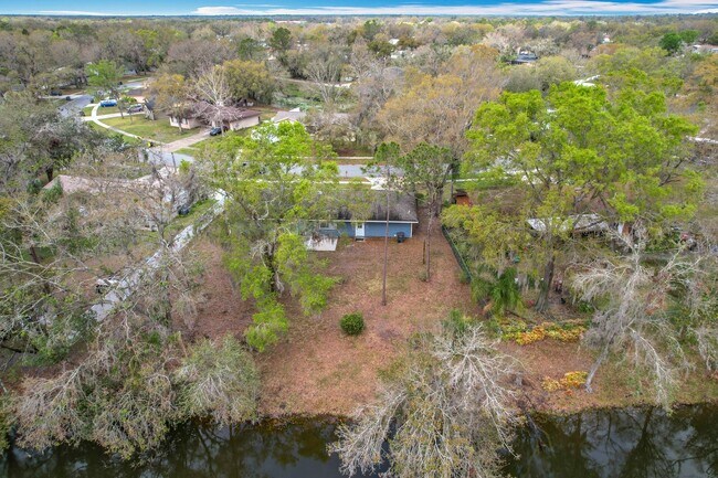 Building Photo - Stunning Waterfront Home located in the de...