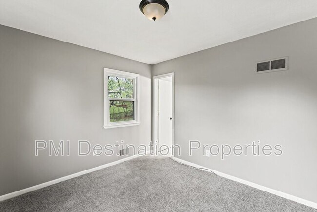 Building Photo - 12012 E 56 St