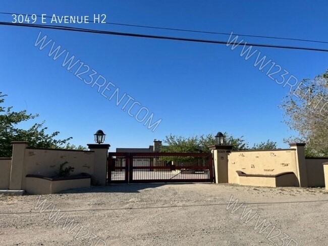 Building Photo - 3049 E Ave H10