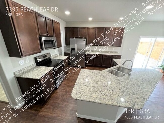 Building Photo - 7335 Peachleaf Dr