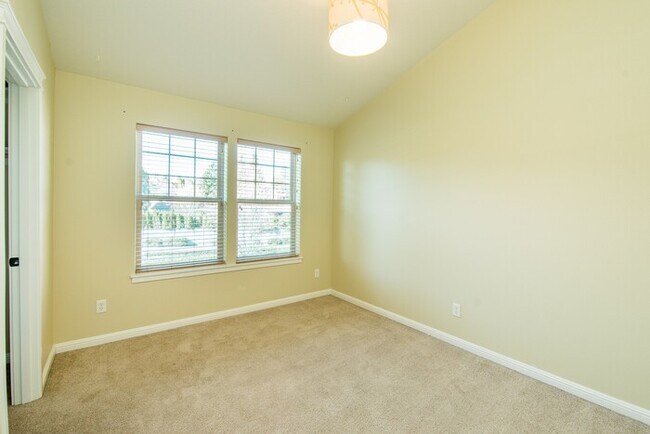 Building Photo - Spring Into Your New Home - Premium Corner Townhome Now Available!