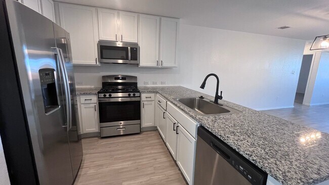 Building Photo - Move in Ready - Pet Friendly with pet door...