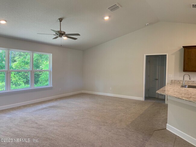 Building Photo - 7429 Zain Michael Ln