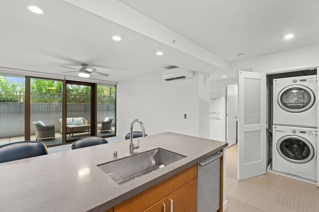 Building Photo - Stylish 1-Bedroom Unit at THE COLLECTION w...