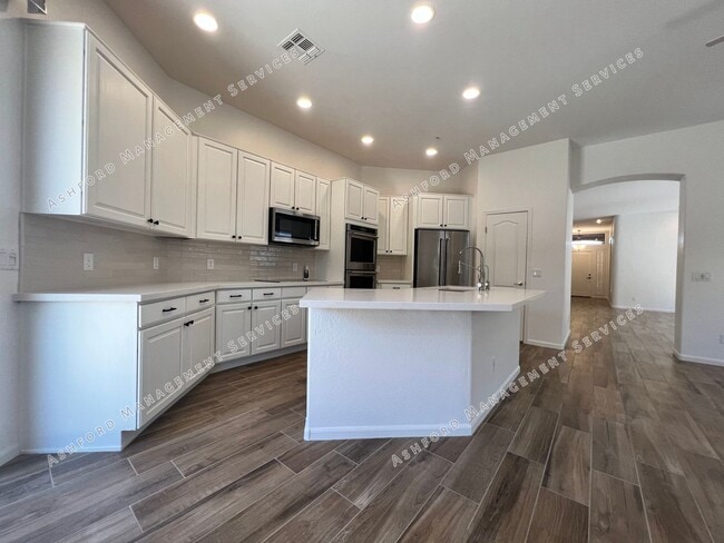 Building Photo - COME HOME TO LUXURY IN GATED GRAYHAWK GOLF...
