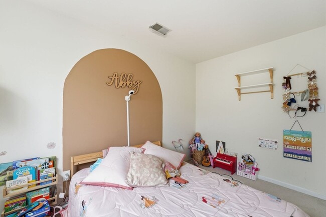 Building Photo - Bathed in natural light, this stunning second level condominium offers an effortless blend of com...