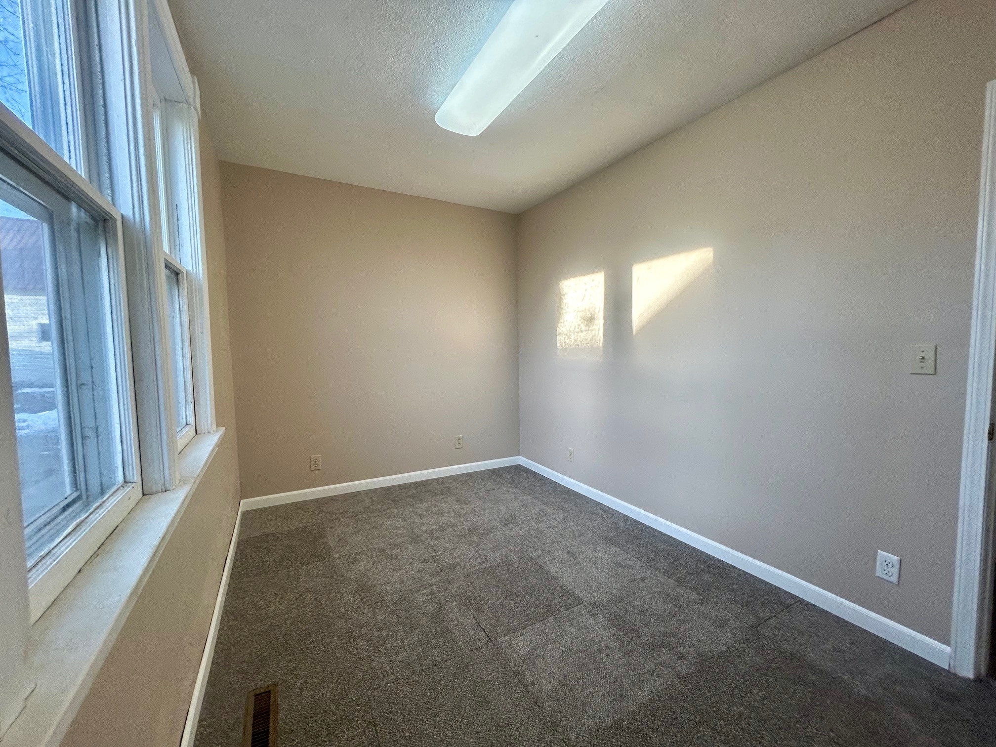 Bedroom 2 with BRAND NEW Carpet - 213 Lake Ave W
