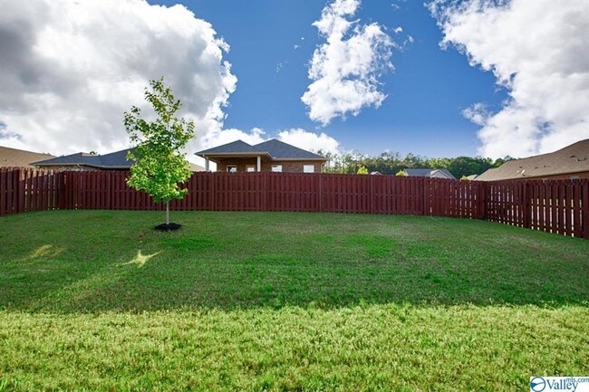 Building Photo - SPACIOUS FOUR BEDROOM BRICK HOME