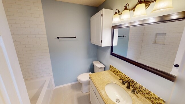 Building Photo - 7535 S Trenton Pl