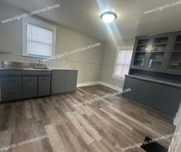 Building Photo - Step into comfort, convenience, and quality living in this conveniently designed 4-bedroom, 2-flo...